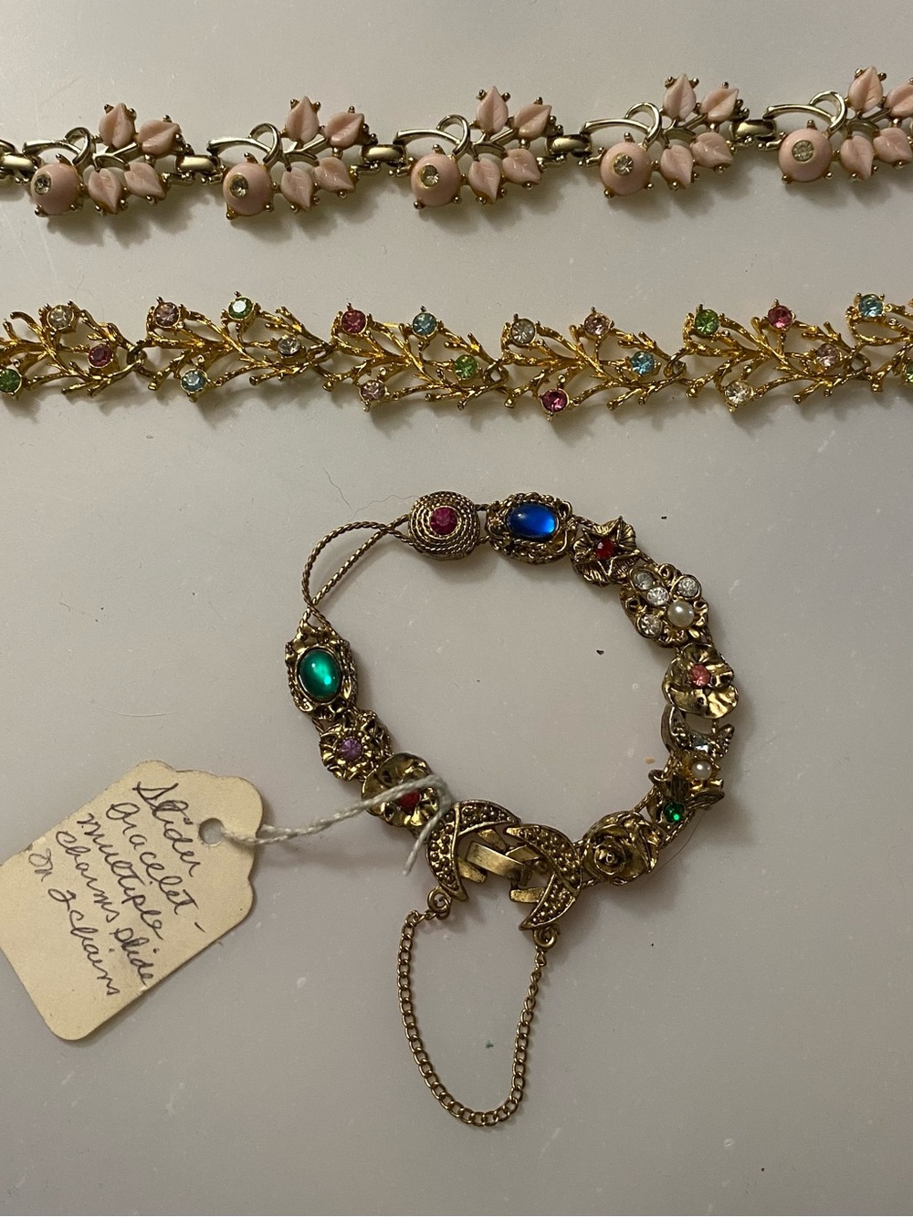 Three Vintage-Gold Tone Bracelets including a signed Kramer of New York